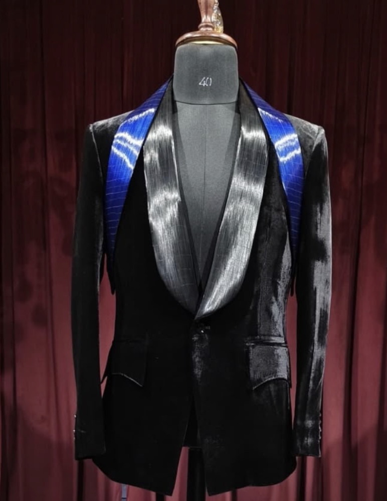 Raw product shot: a tuxedo jacket on a mannequin, as the brand sends it